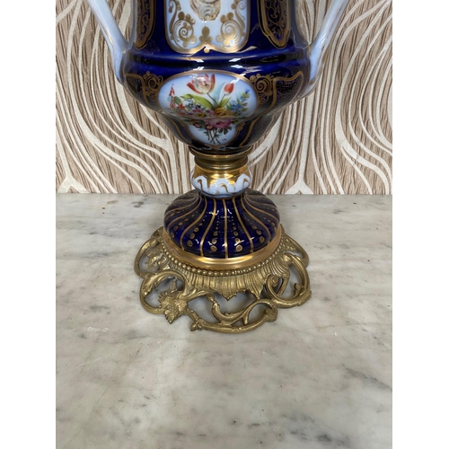 99 - A BEAUTIFUL PAIR OF SEVRES STYLE PORCELAIN & BRASS OIL LAMPS, each with a cobalt blue & gilt coloure... 