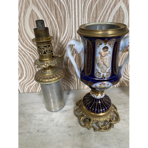 99 - A BEAUTIFUL PAIR OF SEVRES STYLE PORCELAIN & BRASS OIL LAMPS, each with a cobalt blue & gilt coloure... 