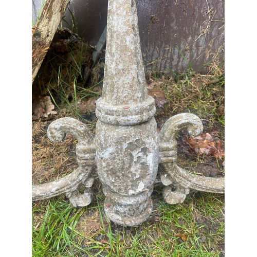 229 - AN ANTIQUE PAIR OF CAST IRON GARDEN LAMPS, each with double head fitting, the graduated column comes... 