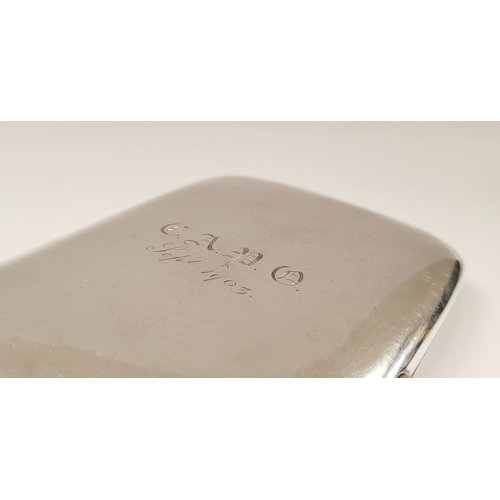 12 - A LARGE EARLY 20TH CENTURY SILVER CIGARETTE CASE, engraved to the front with the initials C.A.P.O. a... 