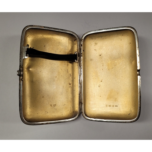 12 - A LARGE EARLY 20TH CENTURY SILVER CIGARETTE CASE, engraved to the front with the initials C.A.P.O. a... 