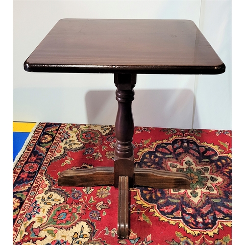 99 - A SQUARE SHAPED ‘PUB TABLE’, with rounded corners, raised on turned wooden column support and termin... 
