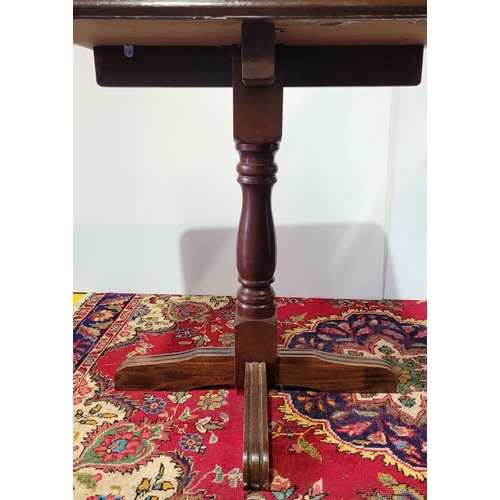 99 - A SQUARE SHAPED ‘PUB TABLE’, with rounded corners, raised on turned wooden column support and termin... 