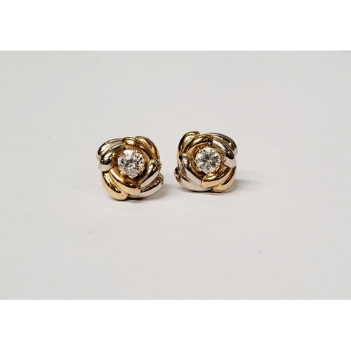 128 - A PAIR OF 9CT DUAL TONED GOLD STUD EARRINGS, with a central solitaire clear gemstone setting, marked... 