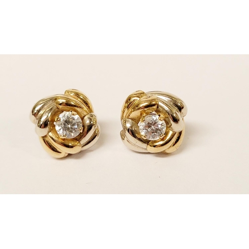 128 - A PAIR OF 9CT DUAL TONED GOLD STUD EARRINGS, with a central solitaire clear gemstone setting, marked... 