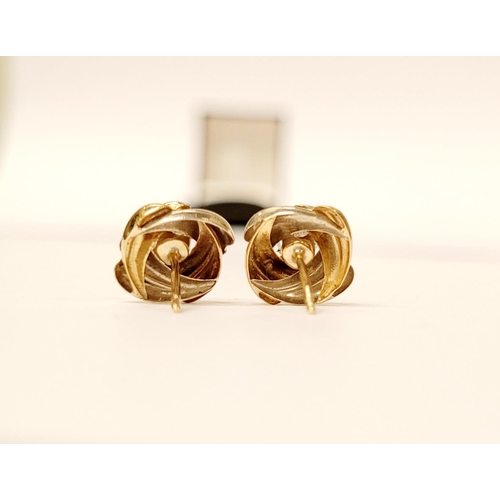 128 - A PAIR OF 9CT DUAL TONED GOLD STUD EARRINGS, with a central solitaire clear gemstone setting, marked... 