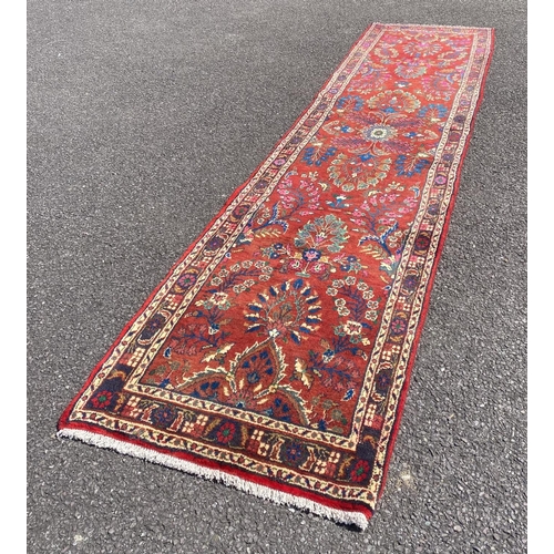 159 - A COLOURFUL QUALITY MODERN PERSIAN RUNNER RUG, hand knotted, dyed with vegetable dye, with floral mo... 