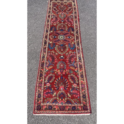 159 - A COLOURFUL QUALITY MODERN PERSIAN RUNNER RUG, hand knotted, dyed with vegetable dye, with floral mo... 
