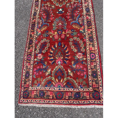 159 - A COLOURFUL QUALITY MODERN PERSIAN RUNNER RUG, hand knotted, dyed with vegetable dye, with floral mo... 