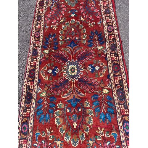 159 - A COLOURFUL QUALITY MODERN PERSIAN RUNNER RUG, hand knotted, dyed with vegetable dye, with floral mo... 