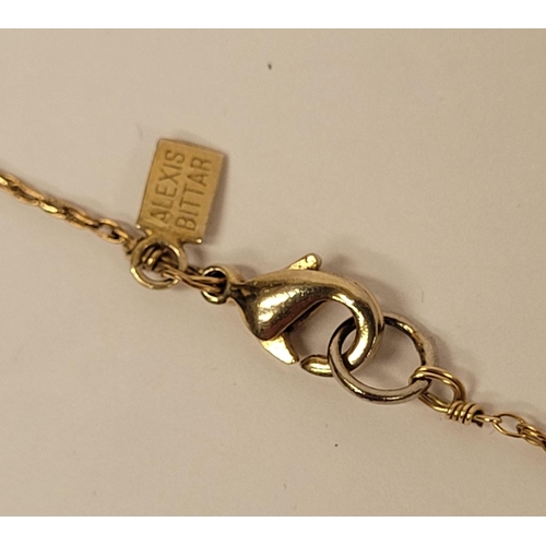 223 - A CASED ALEXIS BITTAR LUCITE & GOLD PENANT NECKLACE, the oval shaped pendant is a bright golden colo... 