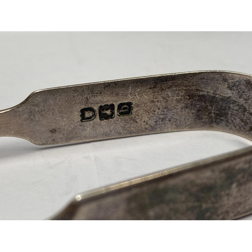 231 - TWO GEORGE V SILVER SUGAR TONGS, (i) Maker Holland, Aldwinckle & Slater (Thomas Alfred Slater, Walte... 