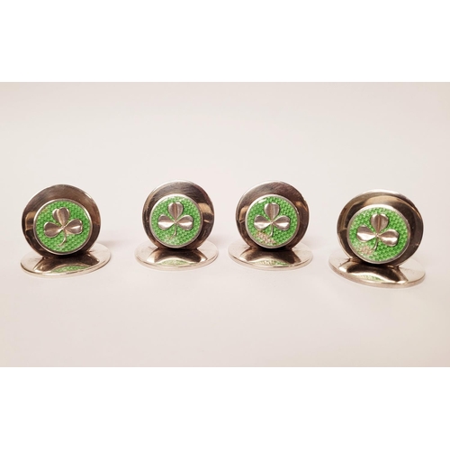 27 - AN EARLY 20TH CENTURY CASED SILVER SET OF FOUR SHAMROCK DECORATED PLACENAME / MENU HOLDERS, each wit... 