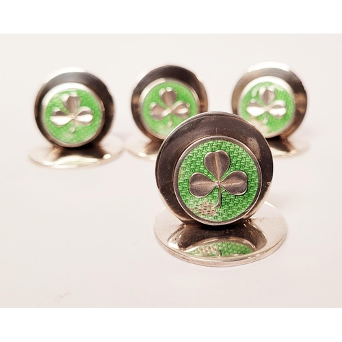 27 - AN EARLY 20TH CENTURY CASED SILVER SET OF FOUR SHAMROCK DECORATED PLACENAME / MENU HOLDERS, each wit... 