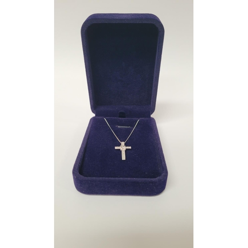 33 - A 9CT WHITE GOLD DIAMOND SET CROSS PENDANT ON A 9CT CHAIN, a beautiful diamond 9ct white gold cross ... 