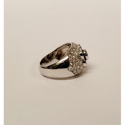 82 - A PRETTY 18CT WHITE GOLD SAPPHIRE & DIAMOND FLORAL CLUSTER / DRESS BOMBE SHAPED RING, the curved set... 