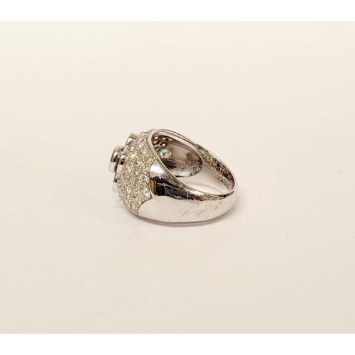82 - A PRETTY 18CT WHITE GOLD SAPPHIRE & DIAMOND FLORAL CLUSTER / DRESS BOMBE SHAPED RING, the curved set... 