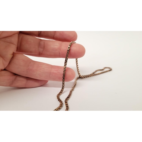 88 - AN EARLY 20TH CENTURY SILVER MEDAL ON AN ITALIAN SILVER CHAIN, the medal with an engraved open work ... 