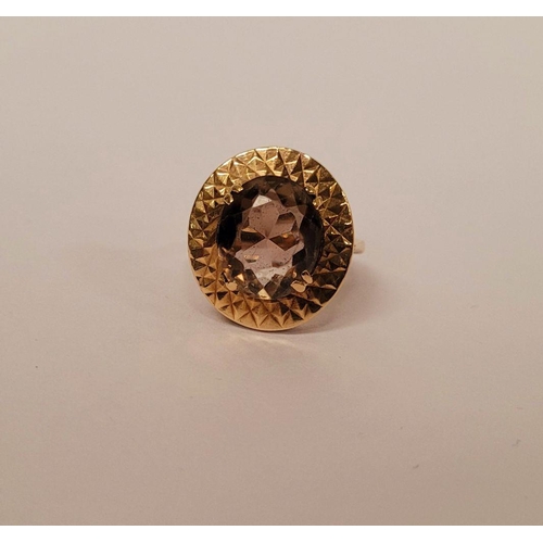 104 - A VERY FINE 9CT YELLOW GOLD SMOKY QUARTZ DRESS RING, the large oval shaped smoky quartz stone is set... 