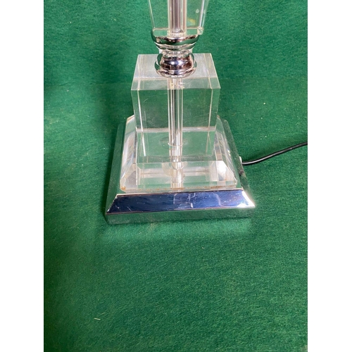 105 - A GOOD PAIR OF CONTEMPORARY GLASS & CHROME TABLE LAMPS, of tapered form on a square plinth base. Ven... 