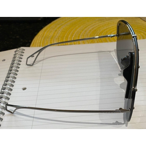 113 - A PAIR OF CASED GUCCI SUNGLASSES, comes with purchase receipts and papers, never used.