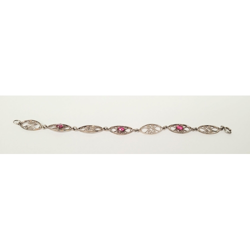 114 - A VINTAGE STERLING SILVER FILGREE WORK BRACELET WITH PINK GEMSTONE SETTING, a lovely piece of jewell... 