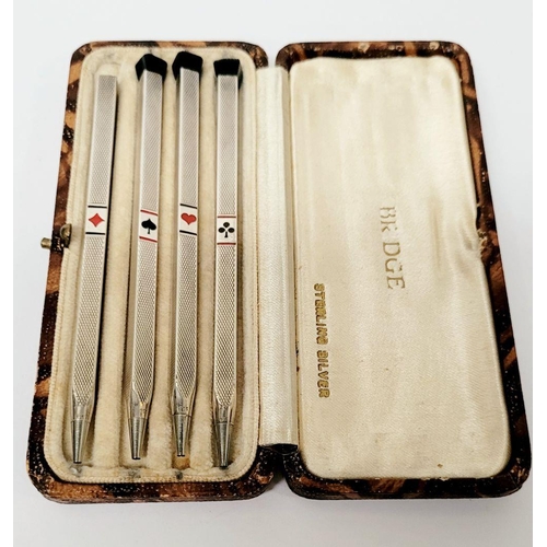 115 - A CASED SET OF SILVER BRIDGE PENCIL HOLDERS, each marked 935 ‘foreign’, (935: Argentium silver). A l... 