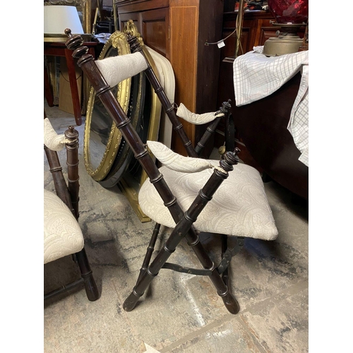 185 - A PAIR OF EXCELLENT 19TH CENTURY CAMPAIGN CHAIRS, folding chairs, the turned supports with finials t... 