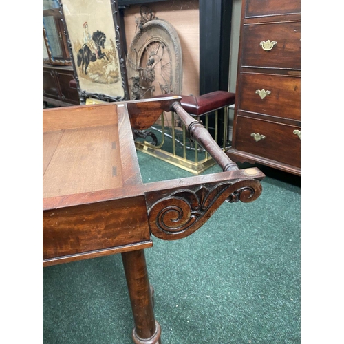 191 - AN ATTRACTIVE MAHOGANY FOLD OVER CARD TABLE, with carved frieze, raised on a pair of side pods, each... 