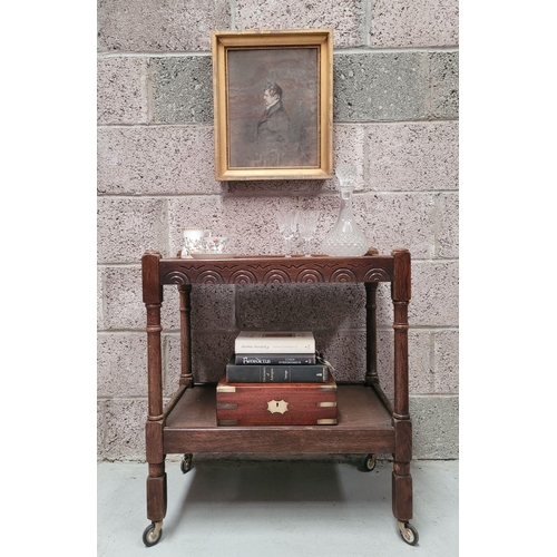 192 - A SMALL TWO-TIER QUATERSAWN OAK WHAT-NOT / TROLLEY, on block and column legs, with distinctive quart... 