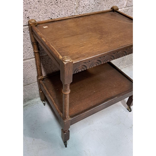 192 - A SMALL TWO-TIER QUATERSAWN OAK WHAT-NOT / TROLLEY, on block and column legs, with distinctive quart... 