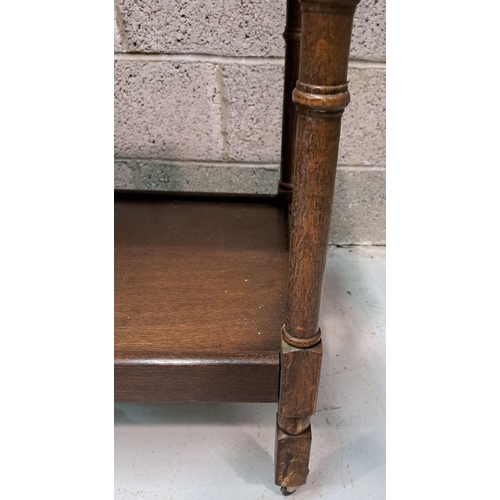 192 - A SMALL TWO-TIER QUATERSAWN OAK WHAT-NOT / TROLLEY, on block and column legs, with distinctive quart... 
