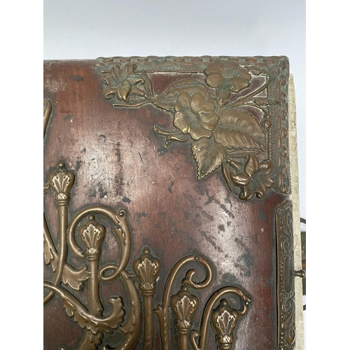 202 - A 19TH CENTURY LEATHER EMBOSSED PHOTO ALBUM, containing a variety of monochrome photographic portrai... 