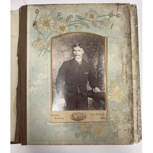 202 - A 19TH CENTURY LEATHER EMBOSSED PHOTO ALBUM, containing a variety of monochrome photographic portrai... 