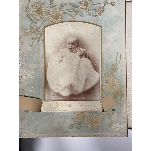 202 - A 19TH CENTURY LEATHER EMBOSSED PHOTO ALBUM, containing a variety of monochrome photographic portrai... 