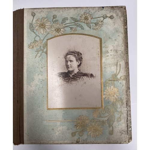 202 - A 19TH CENTURY LEATHER EMBOSSED PHOTO ALBUM, containing a variety of monochrome photographic portrai... 
