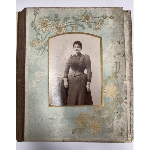 202 - A 19TH CENTURY LEATHER EMBOSSED PHOTO ALBUM, containing a variety of monochrome photographic portrai... 