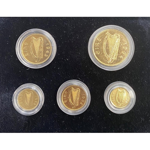 204 - A COLLECTION OF IRISH GOLDEN PREDECIMAL COINS, layered with 24 carat gold and accented with rhodium-... 