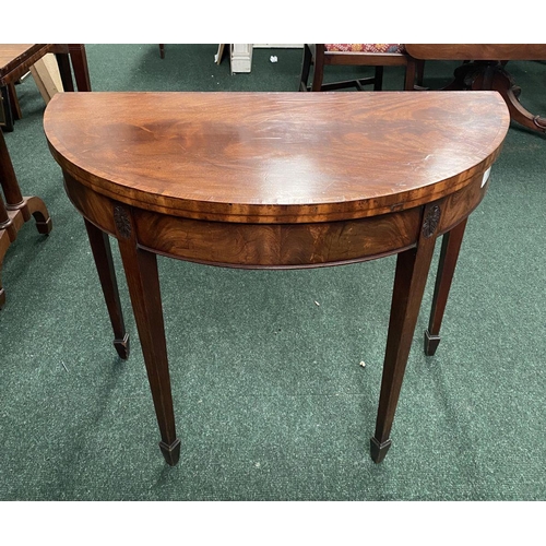 214 - A BRIGHT DEMI LUNE GEORGIAN FLAME MAHOGANY FOLD OVER CARD TABLE, presenting a beautiful finish with ... 