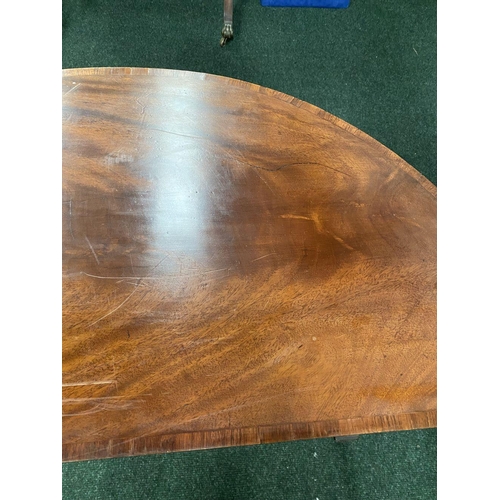 214 - A BRIGHT DEMI LUNE GEORGIAN FLAME MAHOGANY FOLD OVER CARD TABLE, presenting a beautiful finish with ... 