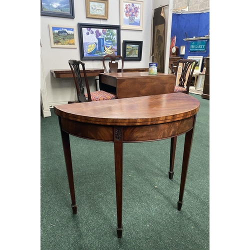 214 - A BRIGHT DEMI LUNE GEORGIAN FLAME MAHOGANY FOLD OVER CARD TABLE, presenting a beautiful finish with ... 