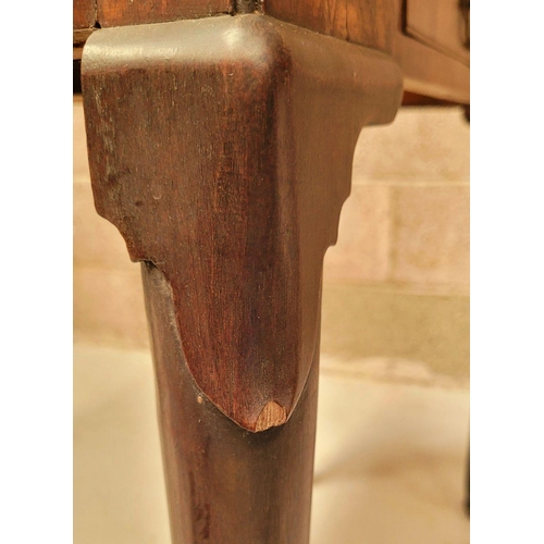 216 - A GOOD GEORGE III FOLD OVER MAHOGANY TEA TABLE with a break front design to the fold over top, venee... 