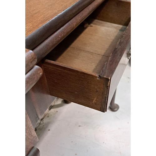 216 - A GOOD GEORGE III FOLD OVER MAHOGANY TEA TABLE with a break front design to the fold over top, venee... 