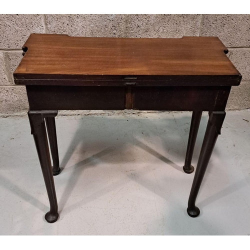 216 - A GOOD GEORGE III FOLD OVER MAHOGANY TEA TABLE with a break front design to the fold over top, venee... 
