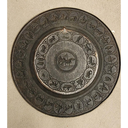 229 - TWO POLISHED BRASS DECORATIVE TRAYS, (i) One a brass zodiac charger/tray; decorated with figures in ... 
