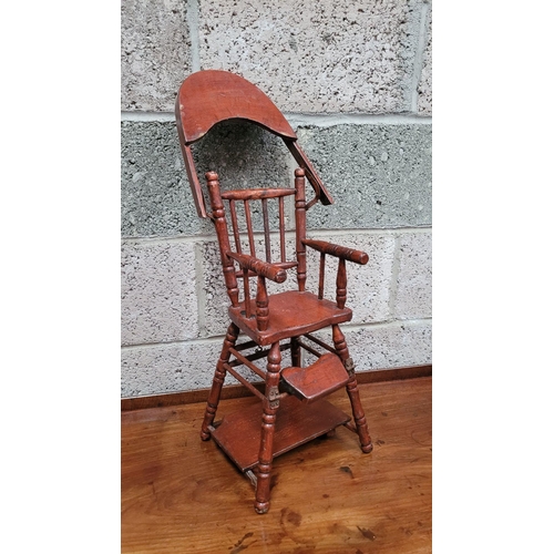 65 - AN ANTIQUE METAMORPHIC DOLLS HIGH CHAIR, with tray & foot rests, turned supports & arm rests. Folds ... 