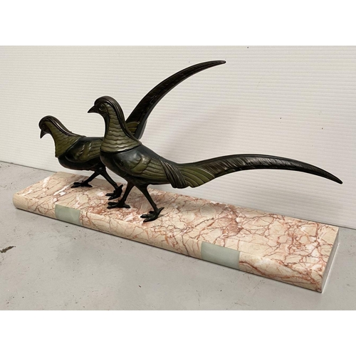 67 - A BRONZE SCULPTURE ON MARBLE BASE, in the form of two pheasants, on mottled rectangular marble base.... 