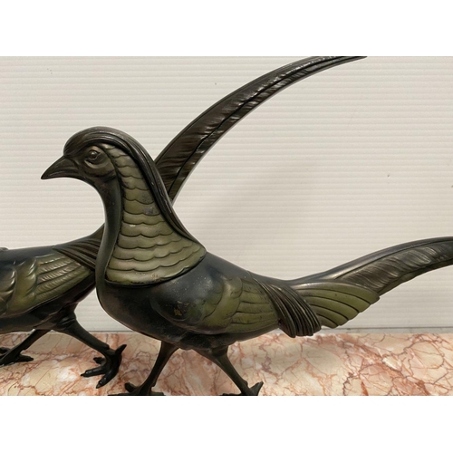 67 - A BRONZE SCULPTURE ON MARBLE BASE, in the form of two pheasants, on mottled rectangular marble base.... 