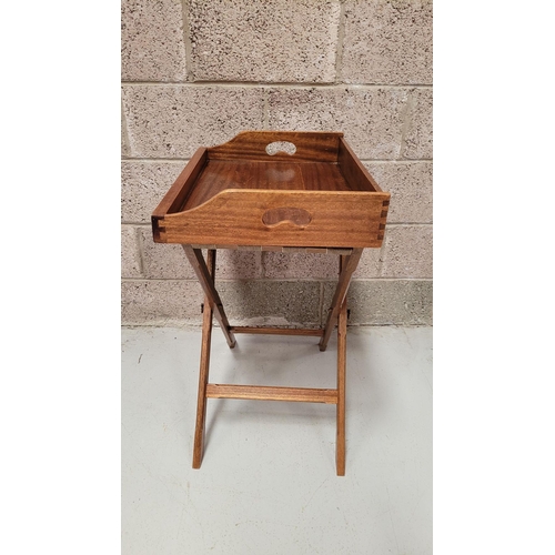 73 - A GOOD FOLDING BUTLER’S TRAY STAND, the tray with raised gallery sides has a pair of kidney shaped p... 