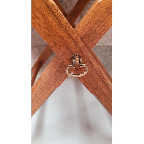 73 - A GOOD FOLDING BUTLER’S TRAY STAND, the tray with raised gallery sides has a pair of kidney shaped p... 